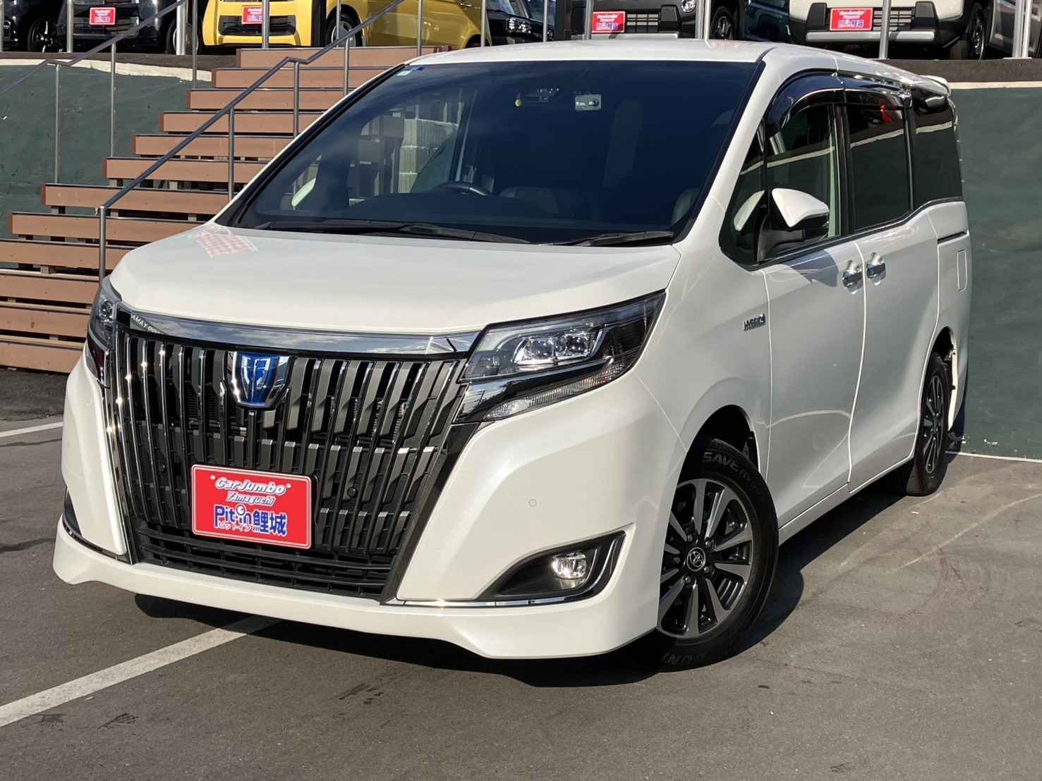 R1年式　トヨタ　エスクァイアハイブリッド　ハイブリッドGi プレミアムパッケージ ブラックテーラード　社外9インチナビ　LEDヘッドライト　両側電動スライドドア　ハーフレザーシート　ドライブレコーダー　前席シートヒーター　ステリングヒーター　【63,100㎞】　26-0339